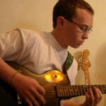 guitarist at student concert